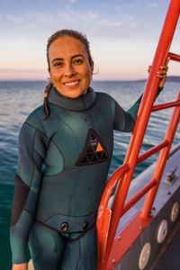 Storyteller and cephalopod expert, Dr. Alex Schnell on board a dive vessel in Port Phillip Bay.  (photo credit: National Geographic/Harriet Spark)
