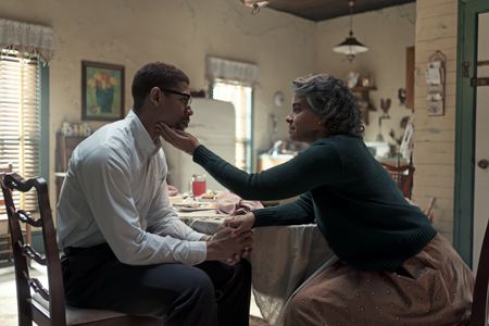 Malcolm, played by Aaron Pierre, visits his mother Louise, played by Parisa Fitz-Henley, in GENIUS: MLK/X. (National Geographic/Richard DuCree)
