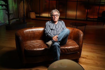 French film critic, author, filmmaker and actor Jean-Pierre Bouyxou poses for a portrait for "Killer Lies: Chasing a True Crime Con Man," a documentary series about obsession and deception, following the unraveling of Stephane Bourgoin’s career as a best-selling author and serial killer expert. (National Geographic/Ben Selkow)