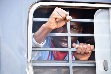 Bobi Wine in a police arrest van after he was arrested in Luuka district, Eastern Uganda, and later charged with spreading a dangerous disease of COVID-19, November 18, 2020.  (photo credit: Lookman Kampala)
