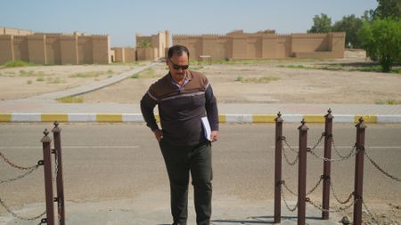 Dr. Ahmad Aziz Salman arrives at the four-square mile site of Babylon, Iraq. (Windfall Films)