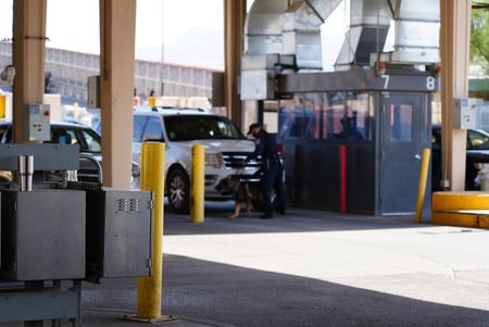 Travelers stop their vehicles at booths at the El Paso border so the CBP officers can confirm entry into the country in El Paso, Texas. (National Geographic)