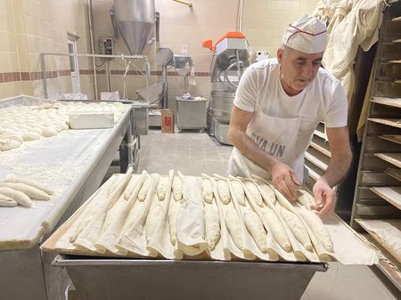 A baker works behind the scenes at Hakan Do?an's bakery, Pasto, in Bursa, Turkey. (National Geographic/Madeline Turrini)