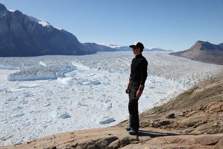 Heidi Sevestre looking at Daugaard-Jensen glacier. (photo credit: National Geographic/Rosie Gloyns)