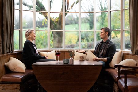 Florence Pugh and Antoni Porowski chat at The Black Swan. (National Geographic/Chris Raphael)