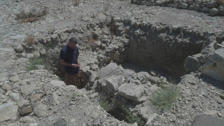 Ido Koch stands at the archaeological site Tel Hadid in Tel Aviv, Israel. (Windfall Films/Nava Mizrahi)