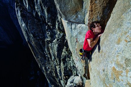 Attached to ropes, Honnold practices a section of Freerider, the route he would free solo up El Capitan.  Freerider tests every part of a climber's body-from fingers to toes-as well as mental and physical stamina. (Jimmy Chin)