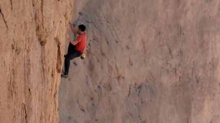 Alex Honnold free solos Les Rivieres Pourpres.  (photo credit: National Geographic)