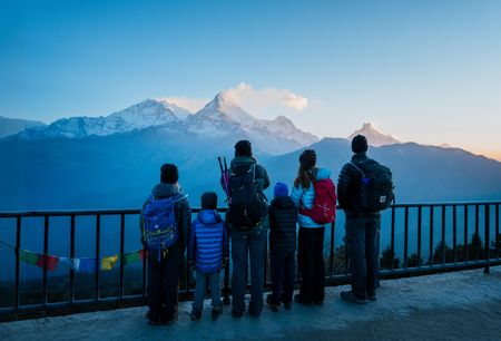 Leo, Laurent, Edith, Colin, Mia, and Sebastien look out at the mountains in the Annapurna range. (Credit: MRC/Jean-Sébastien Francoeur)