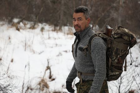 Joel Jacko traveling near his home in the winter season. (National Geographic/Lauren "Bird" Dixon)
