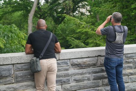 Christian Cooper and his friend, biologist and wildlife conservationist Jeff Corwin, look out from Belvedere Castle in Central Park. (National Geographic/Troy Christopher)