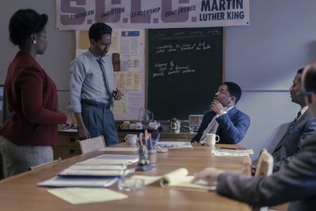 The SCLC members gather to discuss their sit-in approach in GENIUS: MLK/X. (From left: Erica Tazel as Ella Baker, Griffin Matthews as Bayard Rustin, Kelvin Harrison Jr. as Martin Luther King Jr., Hubert Point-Du Jour as Ralph Abernathy, and Vince Pisani as Stanley). (National Geographic/Richard DuCree)