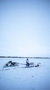 Chip Hailstone collects wood while out on a hunt. (BBC Studios Reality Productions/Ashton Hurlburt)