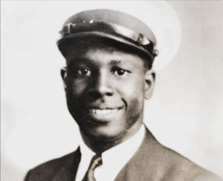 Clark Simmons is seen in close-up portrait. "Erased: WW2's Heroes of Color" tells the stories of three Black heroes who miraculously survived the attack on Pearl Harbor. One of these men was Clark Simmons, who served in the US Navy as mess attendant on the USS Utah. (Family of Clark Simmons/Claudette Simmons)