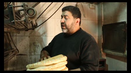 ALEPPO, SYRIA - Despite constant air strikes, a baker living in Aleppo decides he'd rather stay and die in his country. (photo credit:  Junger Quested Films LLC/Turkey Prod Services Co)