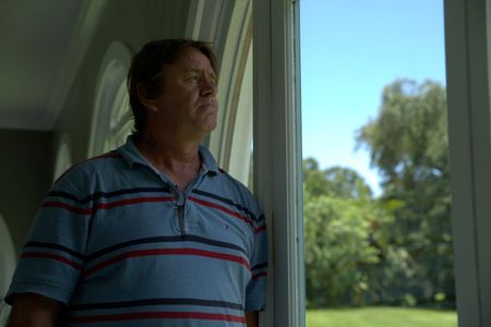 Gracewood Mansion caretaker James Kennedy is pictured in a portrait made during the production of "Cursed Gold: A Shipwreck Scandal." In 1989, maverick scientist Tommy Thompson stuns the world by recovering three tons of gold from a shipwreck deep in the Atlantic Ocean. What follows is a 30-year story of adventure, deception, and personal turmoil, taking him from venerated celebrity to infamous fugitive, and finally a defiant prisoner who refuses to give up his gold. (National Geographic)