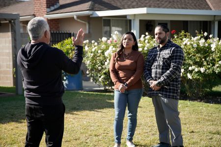 Cesar Millan talking with Albert and Tania. (National Geographic)