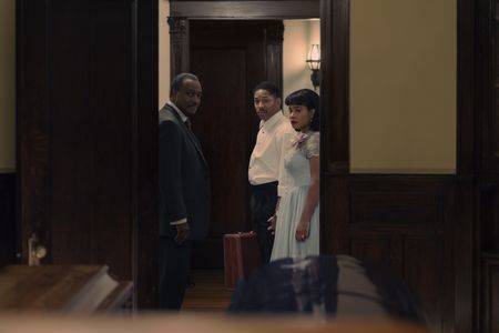 Mr. Wilson, played by Ken Colquitt, leads Martin and Coretta, played by Kelvin Harrison Jr. and Weruche Opia, through the funeral parlor on their wedding night in GENIUS: MLK/X. (National Geographic/Richard DuCree)