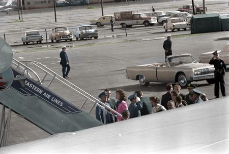 This colorized archival image shows first lady Jacqueline Kennedy boarding Air Force One after President John F. Kennedy's casket was carried onto it at Love Field, Dallas, Nov. 22, 1963. (Cecil Stoughton/White House Photographs/John F. Kennedy Presidential Library and Museum, Boston)