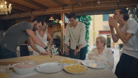 Justin Theroux, Anna Carretti, Antoni Porowski, Marissa Cotti and Riccardo Cotti make Tortellini in Brodo at Antica Osteria del Mirasole. (National Geographic)