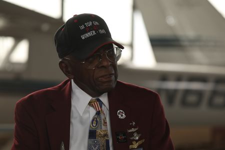 Tuskegee Airman LT. COL. (RET) James H. Harvey sits for an interview at The Tuskegee Airmen National Museum in Detroit. (National Geographic/Rob Lyall)