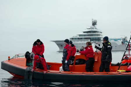 Aldo Kane, Nigel Hussy, Eric Ste-Marie, Melissa Marquez, Cameraman Jamie Holland, and Crew George Scott standing on the FRC in front of OceanXplorer. (National Geographic/Mario Tadinac)