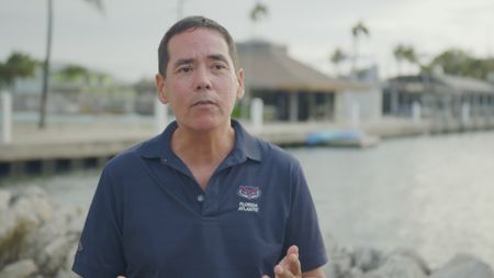 Dr. Stephen Kakiura, expert, discussing how great white sharks are very efficient swimmers and this helps them adapt to colder water temperatures easier than other shark species. (National Geographic)