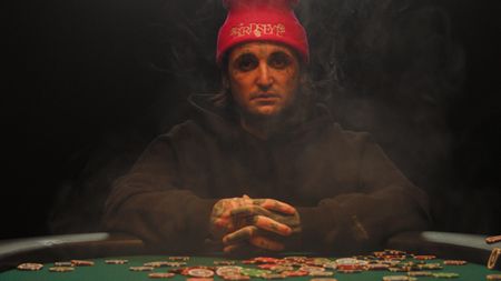 Mikki Mase sits at a poker table. (National Geographic)