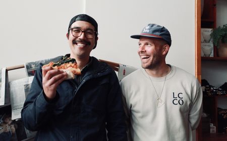 Justin Gomez eats pizza with Josey Baker at The Mill's weekly pizza party in San Francisco.  Justin considers Josey an inspiration. (National Geographic/Ryan Rothmaier)