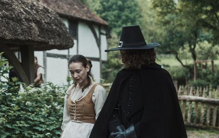 Matthew Hopkins walks with a female villager.(Dash Productions Services LTD/Antoan Ivanov)