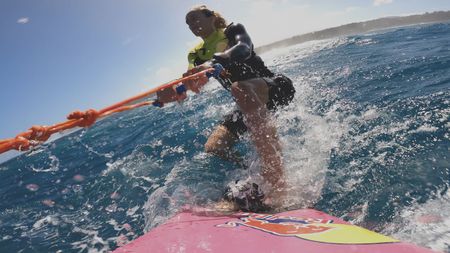 Justine Dupont is pulled out to the waves by a jet ski at Jaws.  (Mandatory photo credit: Justine Dupont)