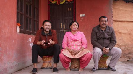 Bhaktapur, Nepal - Santosh Pandey (L) with his parents Chandra Pandey and Gauri Pandey. (Credit: Future of Work Film Inc)