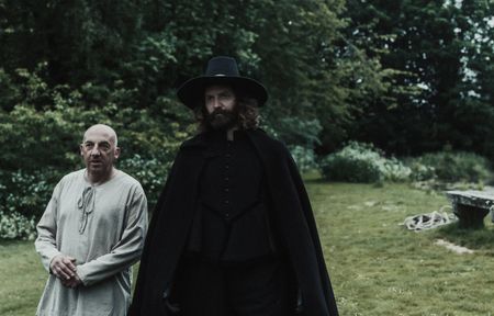 Matthew Hopkins stands in a field with a villager who assisted in the water-trial of John Lowes. (Dash Productions Services LTD/Antoan Ivanov)