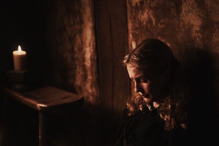 Marit sits in a prison cell after refusing to confess to the accusations of witchcraft. (Dash Productions Services LTD/Antoan Ivanov)