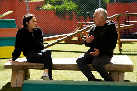 Adriana and Cesar chat at the Dog Psychology Center. (National Geographic)