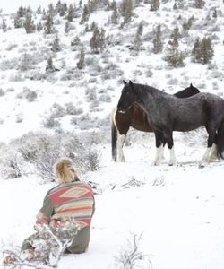 Clare Staples and Blue Zeus the horse in the snow. (Big Wave Productions)