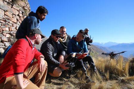 Cusco, Peru - Thomas Hardy, Adan Choqque Arce, Joseph Steel, Duncan Lees, Albert Lin and Alonso Arroyo launch the LiDAR drone at Wat'a in Peru.  (National Geographic)
