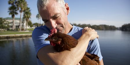 Dave Cox holding Sammin the chicken. (Big Wave Productions)