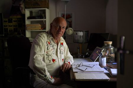 Stéphane Bourgoin is a French author and renowned specialist on serial killers, who since 2019 has been at the center of an internet-led controversy spearheaded by a group of anonymous true crime fans.  Here, Bourgoin poses for a portrait during the production of "Killer Lies: Chasing a True Crime Con Man," a documentary series about obsession and deception, following the unraveling of Stephane Bourgoin’s career as a best-selling author and serial killer expert. (National Geographic/Ben Selkow)