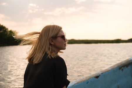 Mariana van Zeller waits at a rendezvous point for a boat smuggling migrants in southern Mexico. (National Geographic for Disney)