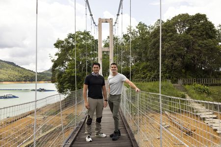 Henry Golding and Antoni Porowski pose for a picture in Bantang Ai. (Credit: National Geographic/Annice Lyn)