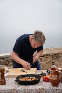 Portugal - Gordon Ramsay works on his fresh sardine dish during the final cook in Portugal. (Credit: National Geographic/Justin Mandel)