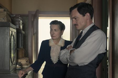 A SMALL LIGHT - Mrs. Stoppelman, played by Liza Sadovy, and Max Stoppelman, played by Sebastian Armesto, as seen in A SMALL LIGHT. (Credit: National Geographic for Disney/Dusan Martincek)