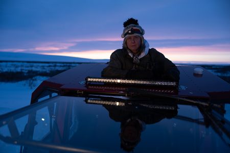 Sue Aikens is on the lookout for ptarmigan and rabbits as an opportunity to gather subsistence food during the winter season. (BBC Studios Reality Productions, LLC/Jayce Kolinski)