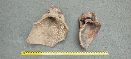 Remains of ancient amphorae on the ground. (Guardia Civil)