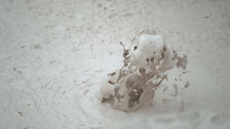 A bubble bursting in a mudpot. (National Geographic)