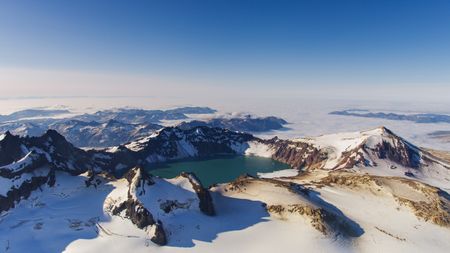 Mount Katmai crater rises above the clouds in Katmai National Park. (credit: National Geographic/Daniel Zatz)