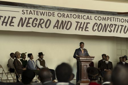 A teen Martin Luther King Jr., played by Jalyn Hall, gives a speech at the statewide oratorical competition in GENIUS: MLK/X. (National Geographic/Richard DuCree)