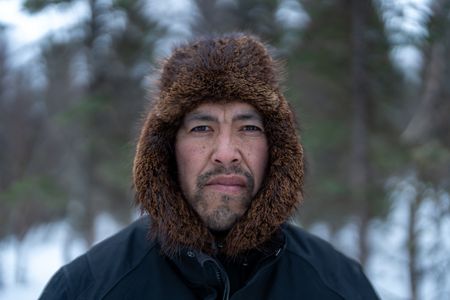 Roger Hamilton Jr. hunts a grizzly bear nearby with his cousin, Chevie Roach. (BBC Studios Reality Productions/Jayce Kolinski)