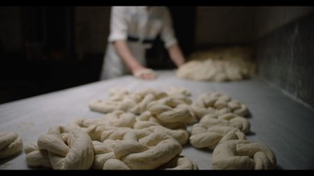 Sami Eryilmaz makes Simit bread at his bakery in Istanbul. (National Geographic)